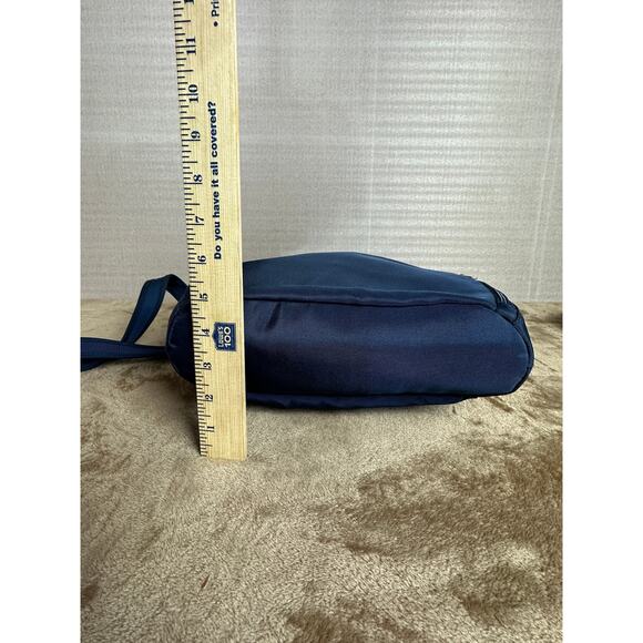 Travel on antitheft classic Crossbody bucket bag navy blue new without tags 
￼ - Picture 6 of 10